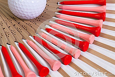 Typical Japanese hand fan and golf equipments Stock Photo