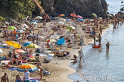 Typical ligurian beach in summertime, in Levanto, La Spezia province near 5 Terre, Italy. Editorial Stock Photo