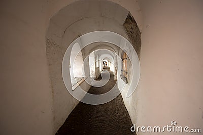 The typical low arcades of the town of Glorenza, province of Bolzano, South Tyrol, Italy Editorial Stock Photo