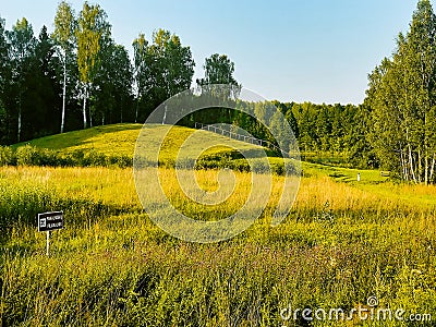 Typical mounds in summer Lithuania countryside. Famous formation to visit in tranquil countryside Baltics Stock Photo