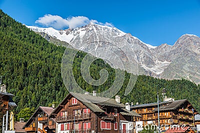 Typical mountain village in the Italian Alps, Macugnaga with the Monte Rosa Stock Photo