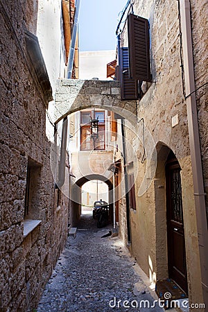 Typical narrow lane in Lindos, Rhodes, Greece Stock Photo