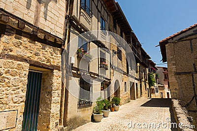 Typical narrow street in Frias. Burgos Stock Photo