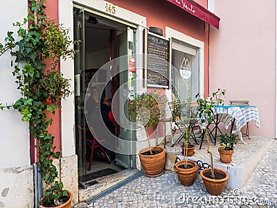 Typical restaurant in the Old Town of Lisbon Editorial Stock Photo