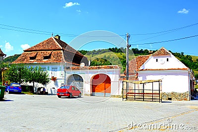 Typical rural landscape in the village Dealu Frumos-Schoenberg, Transylvania,Romania Editorial Stock Photo