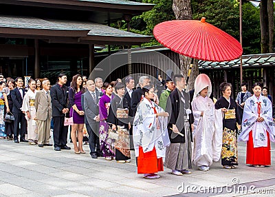 Typical Shinto wedding with a cortege of guests Editorial Stock Photo