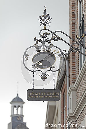 Typical sign in gallery street of traditional Dutch town Editorial Stock Photo