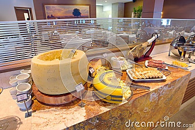 Self service restaurant and barbecue steakhouse. Cheese table. Stock Photo