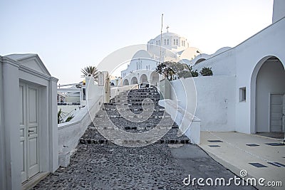 Typical street in Thira on the island of Santorini, Greece. Travel, Cruises, Architecture, Landscapes. Greek street and Orthodox Stock Photo