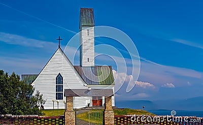 Typical traditional white lutheran church (HallgrÃ­mskirkja Ã­ SaurbÃ¦, HvalfjarÃ°arsveit), West Iceland Stock Photo