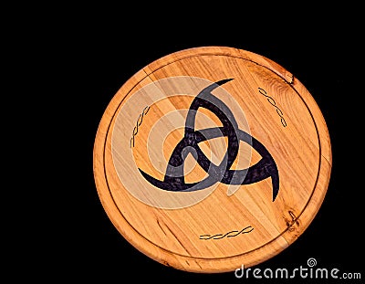 Typical Tribal Sign on a Wooden Surfface Stock Photo