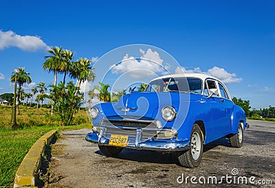 Typical view of classic blue American car on Cuba,Havana Editorial Stock Photo