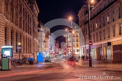 Typical view of the Parisian street by night, 2 Rue du Faubourg du Temple, Paris france Architecture Editorial Stock Photo