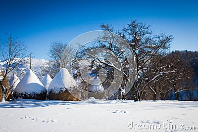 Typical winter scenic view with hayracks Stock Photo