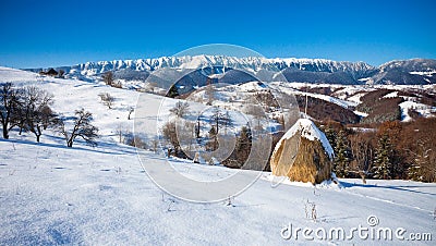 Typical winter scenic view with hayracks Stock Photo