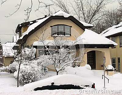Typical Wisconsin house after heavy snow fall Stock Photo