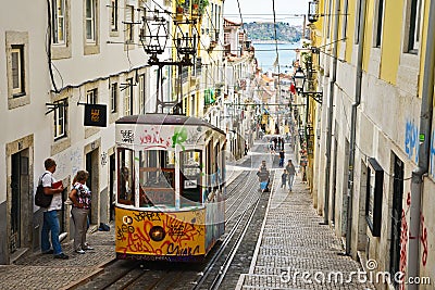 Typical yellow tram , Lisbon, Portugal. Editorial Stock Photo