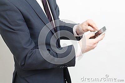 Typing on cell phone Stock Photo