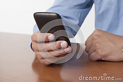 Typing on cell phone Stock Photo