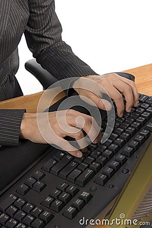 Typing on a keyboard Stock Photo