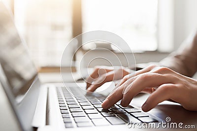 Typing on laptop closeup, chatting in Facebook Stock Photo