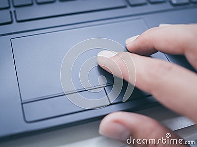 Typing on laptop keyboard Stock Photo