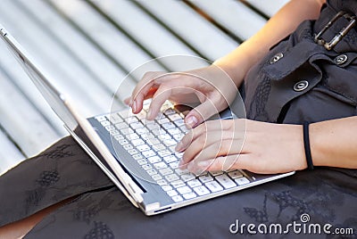 Typing on notebook... Stock Photo