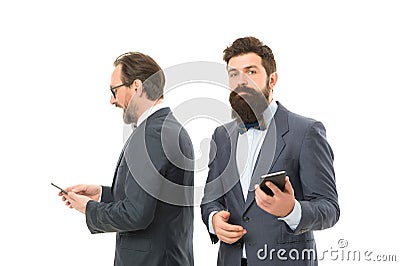 Typing quick message. mature men. Agile business. partnership of men speaking on phone. bearded businessmen in formal Stock Photo