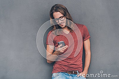 Typing quick message to friend. Stock Photo