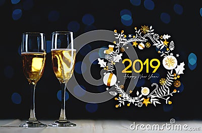 2019 Typography Art. Two Glasses of Champagne Dark Glow Lights B Stock Photo