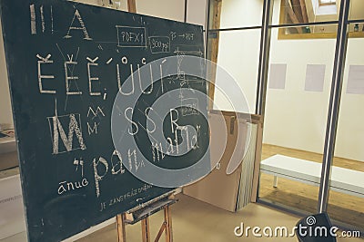 Typography lesson with blackboard with handwritten chalk letters Stock Photo