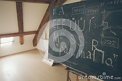 Typography lesson with blackboard with handwritten chalk letters Stock Photo