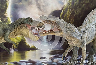 Tyrannosaurus rex fighting versus a Spinosaur with waterfall in the background Editorial Stock Photo