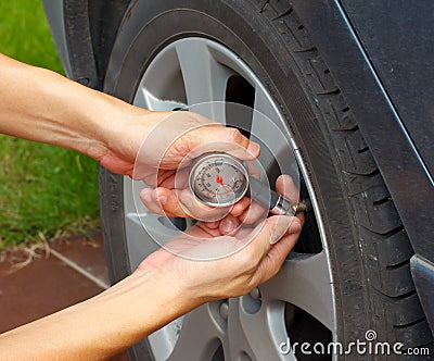 Tyre pressure guage measurement Stock Photo