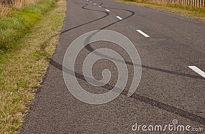 Tyre skid marks on rural road, Gisborne, New Zealand Stock Photo