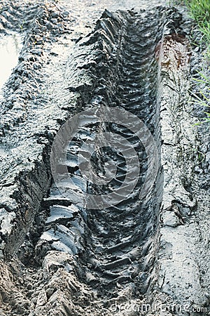 Tyre track on dirt sand or mud Stock Photo