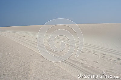 Tyre tracks across sand Stock Photo
