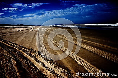 Tyre Tracks on beach Stock Photo