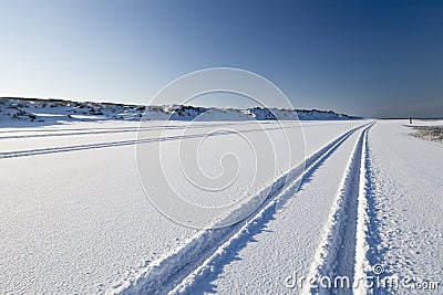 Tyre tracks in the snow Stock Photo