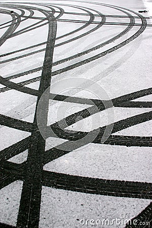 Tyre tracks in snow Stock Photo