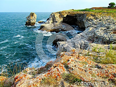 Tyulenovo is famous for its unique beach and caves, fresh air and its unique nature. Stock Photo