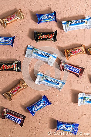 Tyumen, Russia-January 23, 2022: Assortment candy bars mini flat lay from Mars Chocolate. Vertical photo Editorial Stock Photo