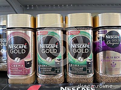 Tyumen, Russia-July 28, 2022: Nescafe Gold origins alta rica, sumatra. Powdered coffee made by Nestle Editorial Stock Photo