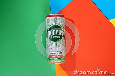 Tyumen, Russia-June 30, 2022: Perrier is a French brand of premium mineral water, energize caffeine yerba mate. French Editorial Stock Photo