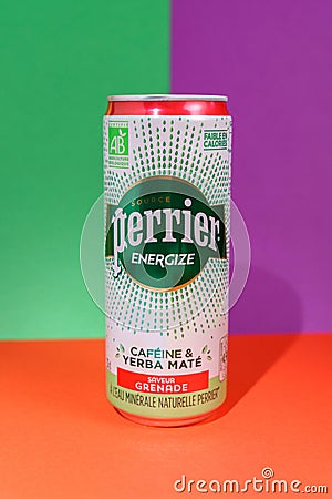 Tyumen, Russia-June 30, 2022: Mineral water Perrier energize caffeine yerba mate. Vertical photo Editorial Stock Photo