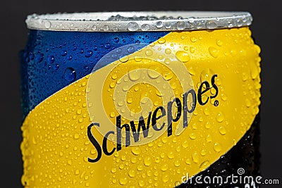 Tyumen, Russia-May 25, 2021: Can of the Schweppes logo close up. Water drops. Editorial Stock Photo