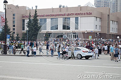 Tyumen, Russia, on May 9, 2019: People walk on the square on the holiday Victory Day Editorial Stock Photo