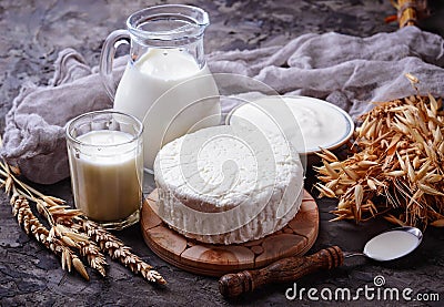 Tzfat cheese, milk and wheat grains. Symbols of judaic holiday S Stock Photo