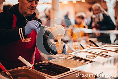 TÃ¼bingen, Germany - December 6, 2019: Chocolate market chocolART with christmas booths and stalls with many people standing in Editorial Stock Photo