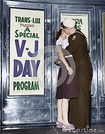 U.S. sailor and his girlfriend celebrate news of the end of war with Japan in front of the Trans-Lux Theatre in New York's Time Sq Editorial Stock Photo